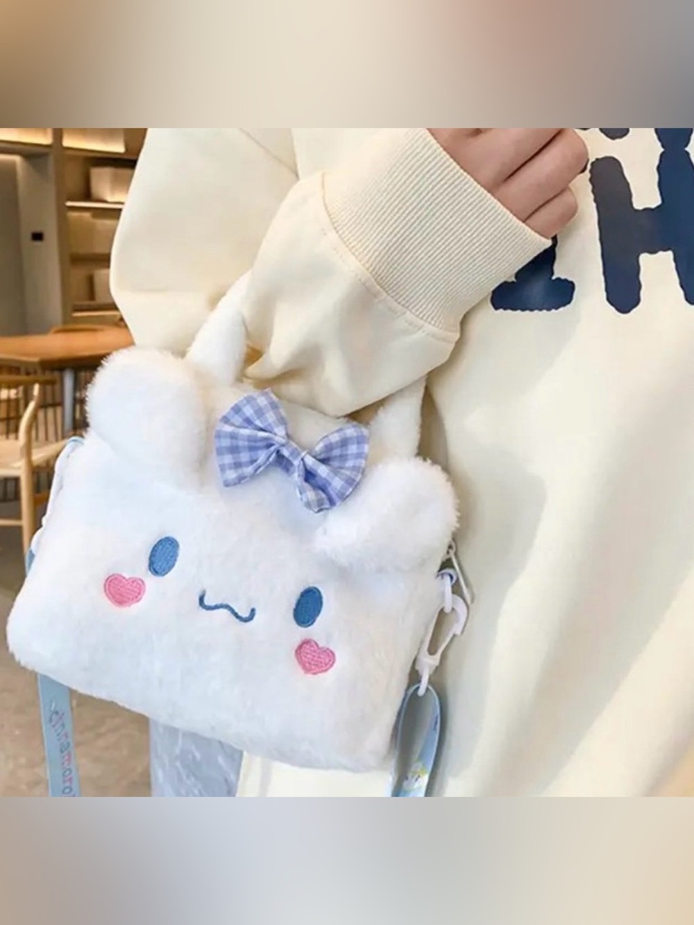 Sanrio CinnamoRoll Plush
Crossbody Bag Purse
Adjustable Fuzzy Hello Kitty
Emo
